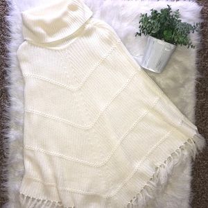 Cream turtleneck poncho